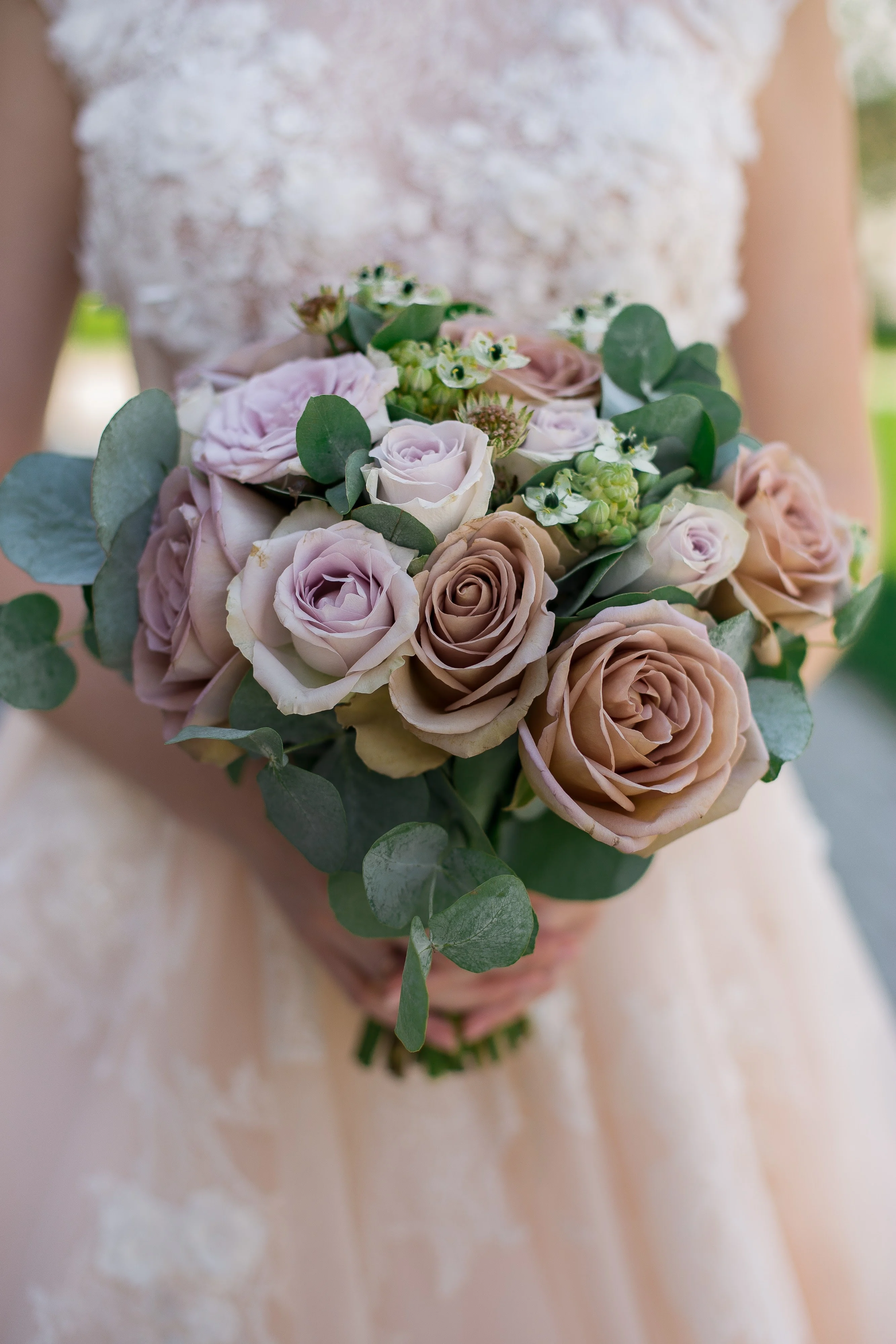 Dusty rose wedding bouquet and dress