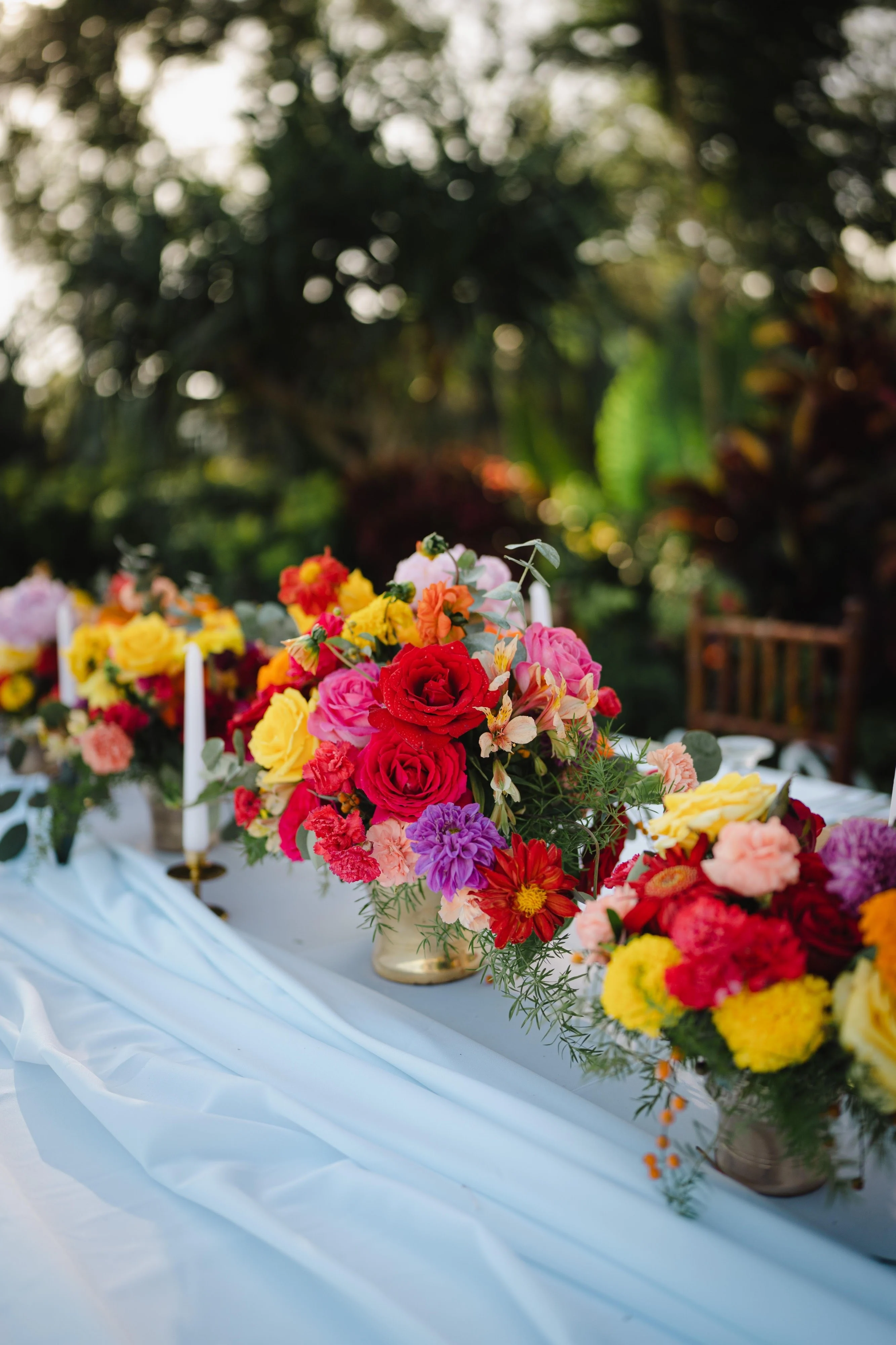 Colourful wedding table with bright flowers