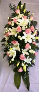 Rose and lily double ended coffin spray delivery to Holcombe