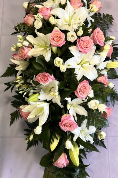 Rose and lily double ended coffin spray