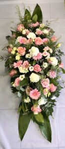 Florist choice double ended funeral spray delivery to Holcombe